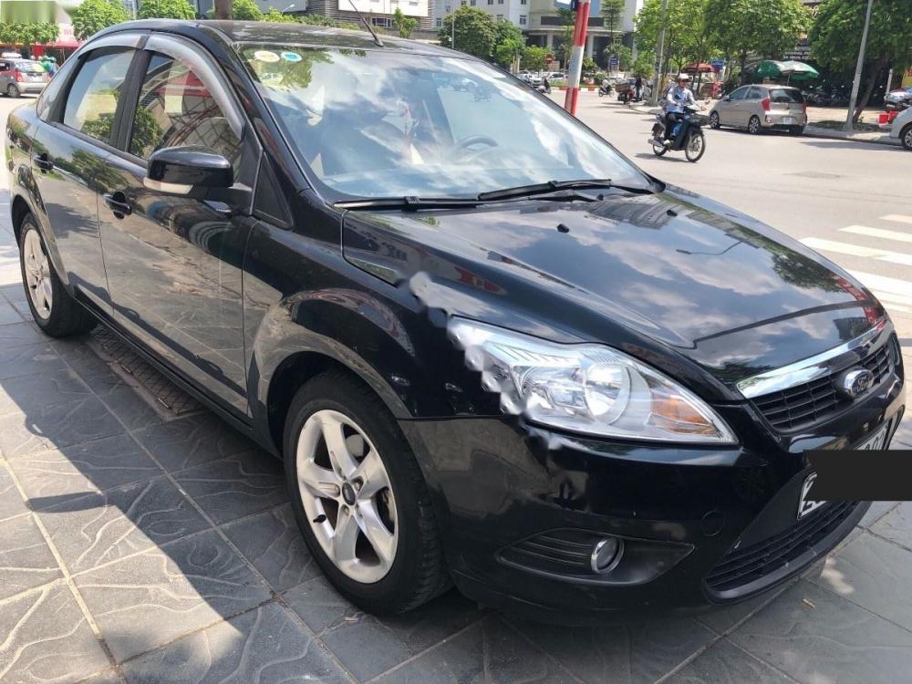 Ford Focus 2011 - Cần bán xe Ford Focus sản xuất 2011, màu đen như mới