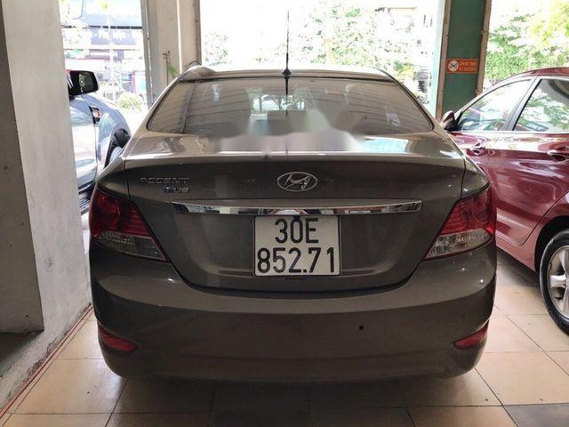 Hyundai Accent   1.4  2014 - Cần bán gấp Hyundai Accent 1.4 năm 2014, màu nâu