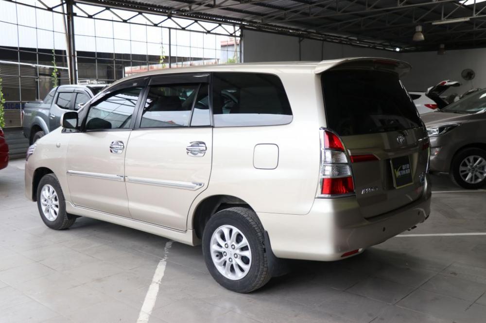 Toyota Innova E 2.0MT 2014 - Cần bán xe Toyota Innova E 2.0MT sản xuất 2014, màu vàng