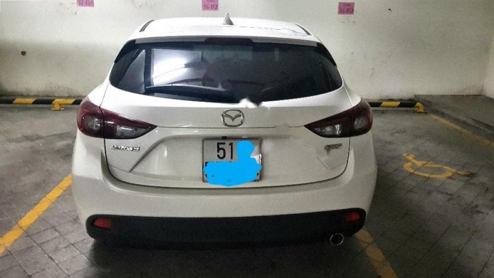 Mazda 3 2016 - Bán ô tô Mazda 3 sản xuất 2016, màu trắng, giá chỉ 613 triệu