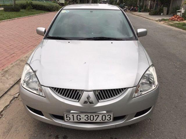 Mitsubishi Lancer    2004 - Bán xe Mitsubishi Lancer đời 2004, màu bạc ít sử dụng giá cạnh tranh