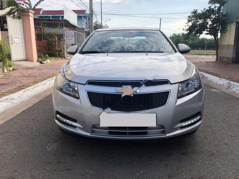 Chevrolet Cruze LS 1.6 MT 2012 - Cần bán xe Chevrolet Cruze LS 1.6 MT đời 2012, màu bạc, giá chỉ 328 triệu