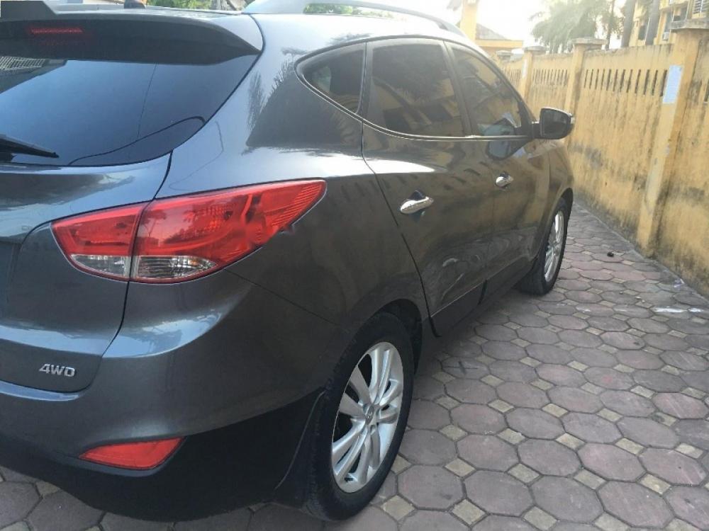 Hyundai Tucson 2010 - Cần bán xe Hyundai Tucson sản xuất 2010, màu xám, nhập khẩu nguyên chiếc số tự động, 568tr