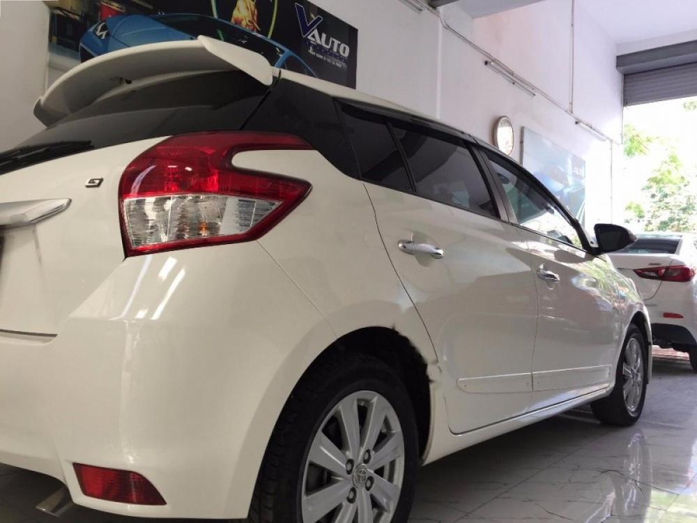 Toyota Yaris 1.3G 2014 - Cần bán lại xe Toyota Yaris 1.3G sản xuất năm 2014, màu trắng, nhập khẩu nguyên chiếc, 570 triệu