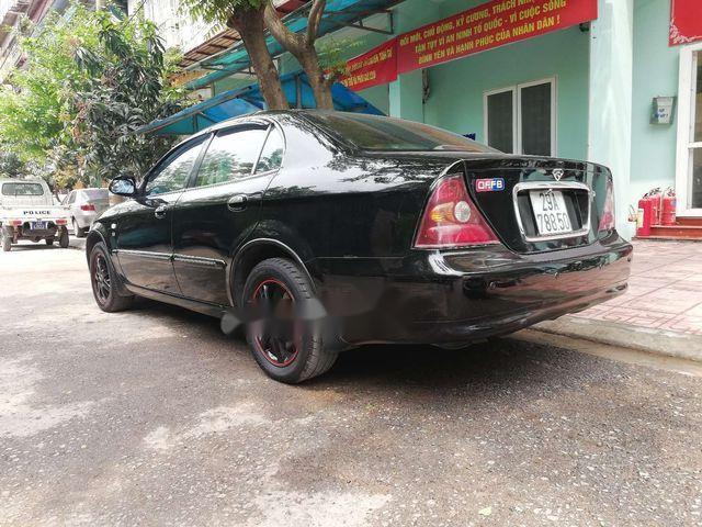 Daewoo Magnus   2.5 AT  2004 - Bán Daewoo Magnus 2.5 AT sản xuất 2004, màu đen 