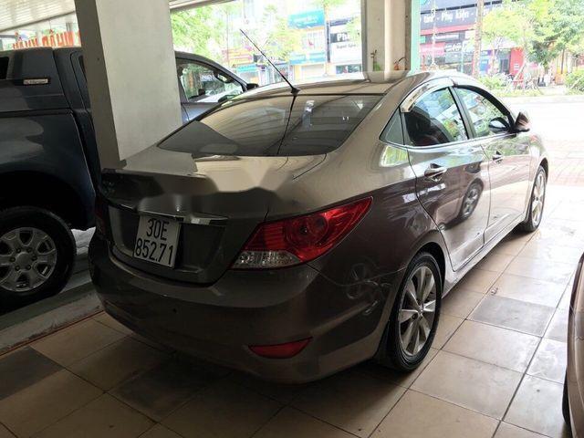 Hyundai Accent   1.4  2014 - Cần bán gấp Hyundai Accent 1.4 năm 2014, màu nâu