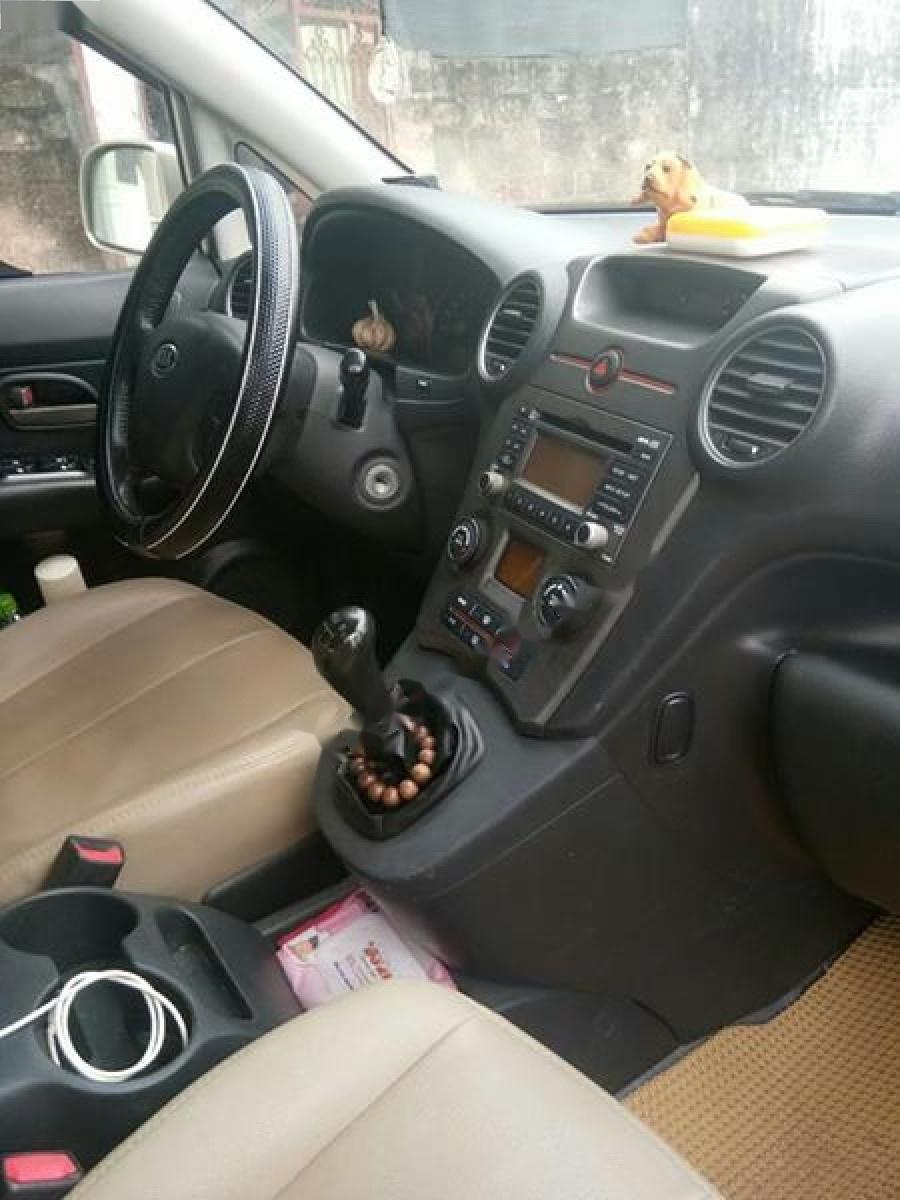 Kia Carens EX 2.0 MT 2009 - Bán Kia Carens EX 2.0 MT đời 2009, màu vàng chính chủ