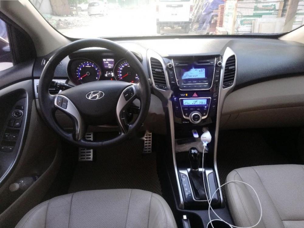 Hyundai i30 1.6 AT 2013 - Cần bán lại xe Hyundai i30 sản xuất 2013, màu đen, xe nhập, 525tr