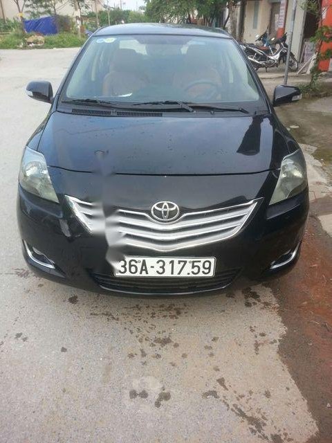 Toyota Vios E 2009 - Cần bán xe Toyota Vios E năm 2009, màu đen, 290 triệu