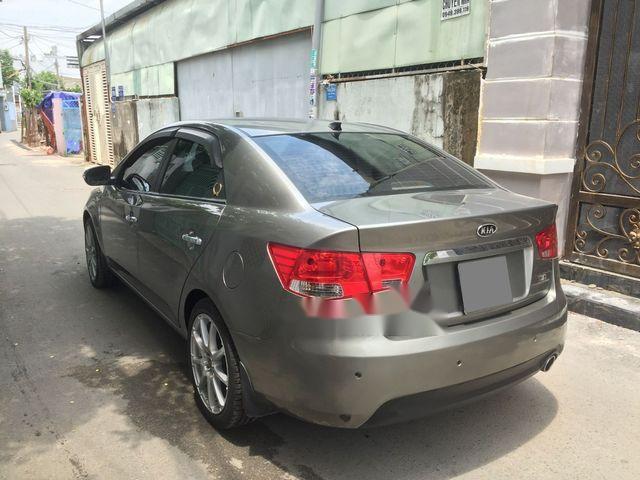 Kia Forte 2011 - Bán Kia Forte đời 2011, màu vàng cát