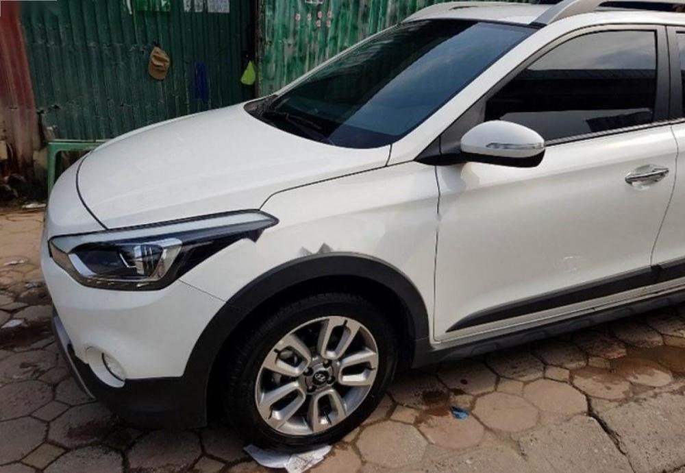 Hyundai i20 Active  1.4 AT 2015 - Bán xe Hyundai i20 Active 1.4 AT sản xuất 2015, màu trắng, nhập khẩu