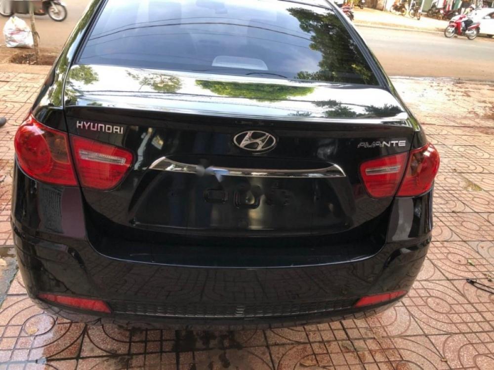 Hyundai Avante 1.6 MT 2013 - Cần bán xe Hyundai Avante 1.6 MT đời 2013, màu đen, giá tốt