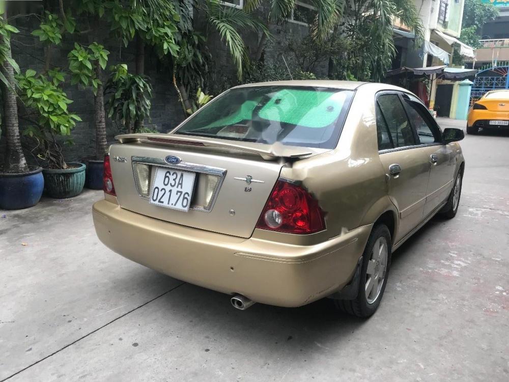 Ford Laser 2002 - Bán xe Ford Laser sản xuất 2002, màu vàng, 200tr