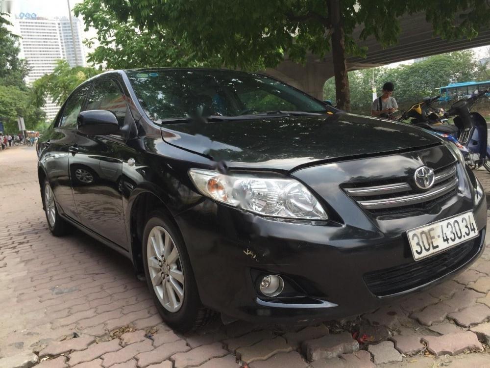 Toyota Corolla 2009 - Bán Toyota Corolla sản xuất năm 2009, màu đen, xe nhập, 475 triệu