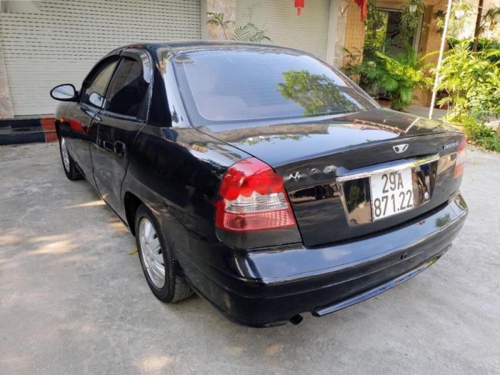 Daewoo Nubira 1.6 2001 - Cần bán gấp Daewoo Nubira 1.6 đời 2001, màu đen