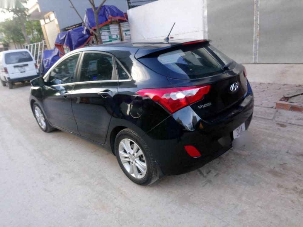 Hyundai i30 1.6 AT 2013 - Cần bán lại xe Hyundai i30 sản xuất 2013, màu đen, xe nhập, 525tr