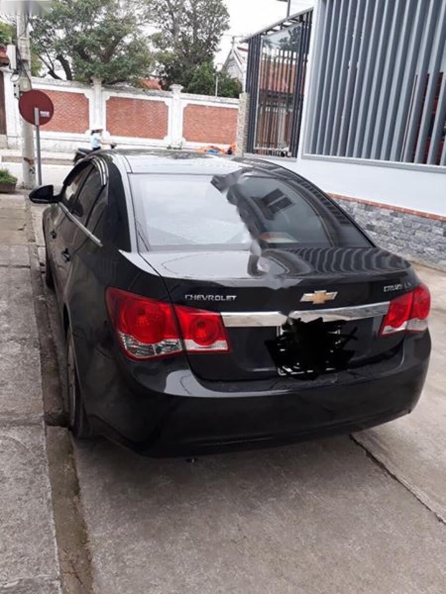 Chevrolet Cruze LS 1.6 MT 2010 - Bán Chevrolet Cruze LS 1.6 MT đời 2010, màu đen, giá 288tr