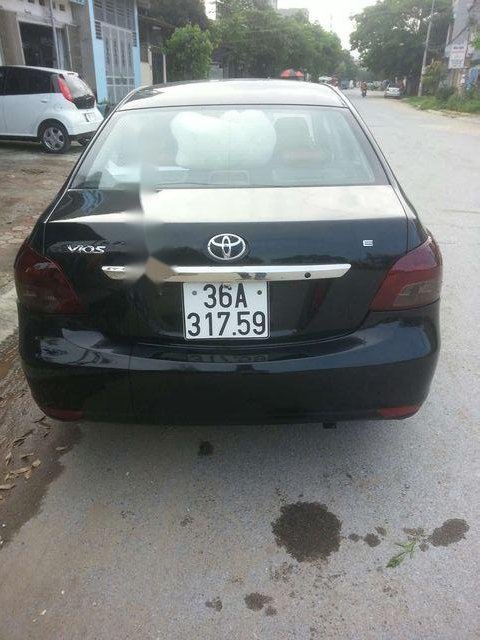 Toyota Vios E 2009 - Cần bán xe Toyota Vios E năm 2009, màu đen, 290 triệu