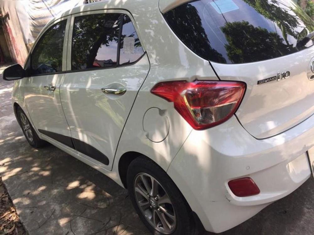 Hyundai Grand i10 1.2 AT 2016 - Bán xe Hyundai Grand i10 1.2 AT đời 2016, màu trắng, xe nhập đẹp như mới, 412 triệu