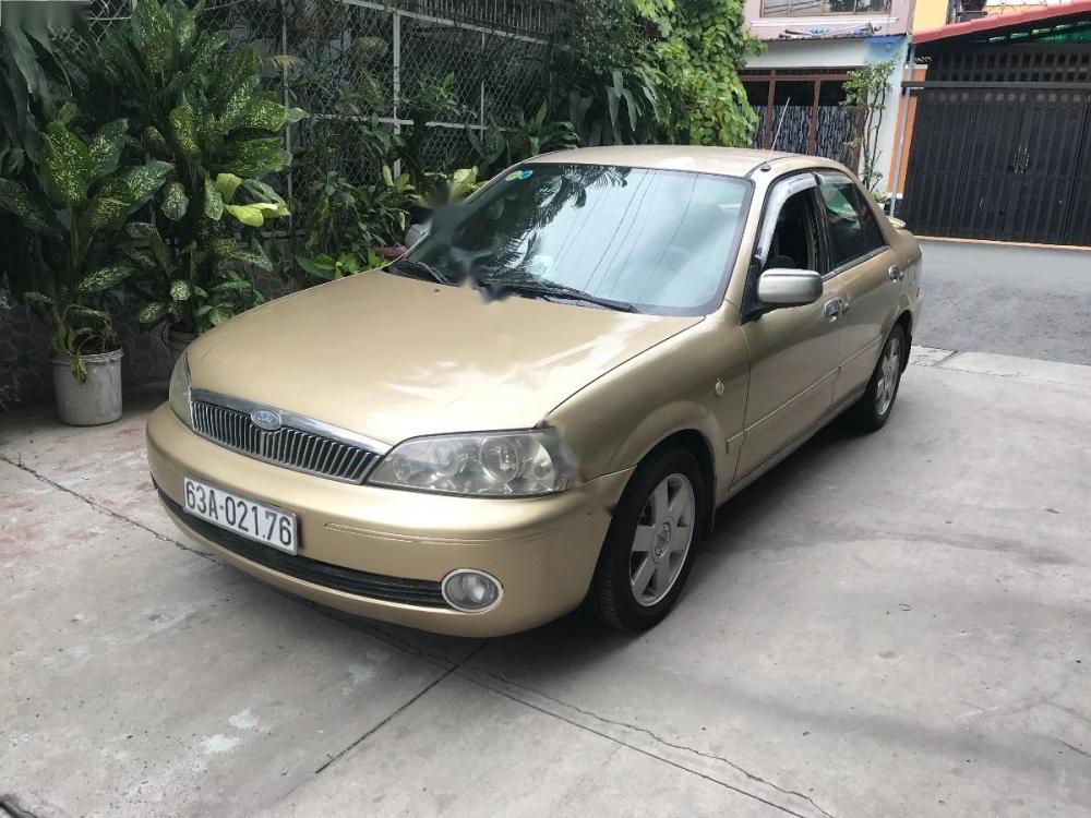 Ford Laser 2002 - Bán xe Ford Laser sản xuất 2002, màu vàng, 200tr