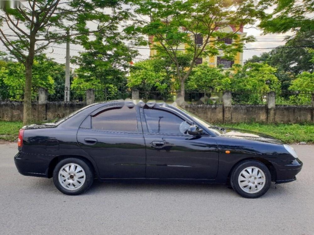 Daewoo Nubira 1.6 2001 - Cần bán gấp Daewoo Nubira 1.6 đời 2001, màu đen