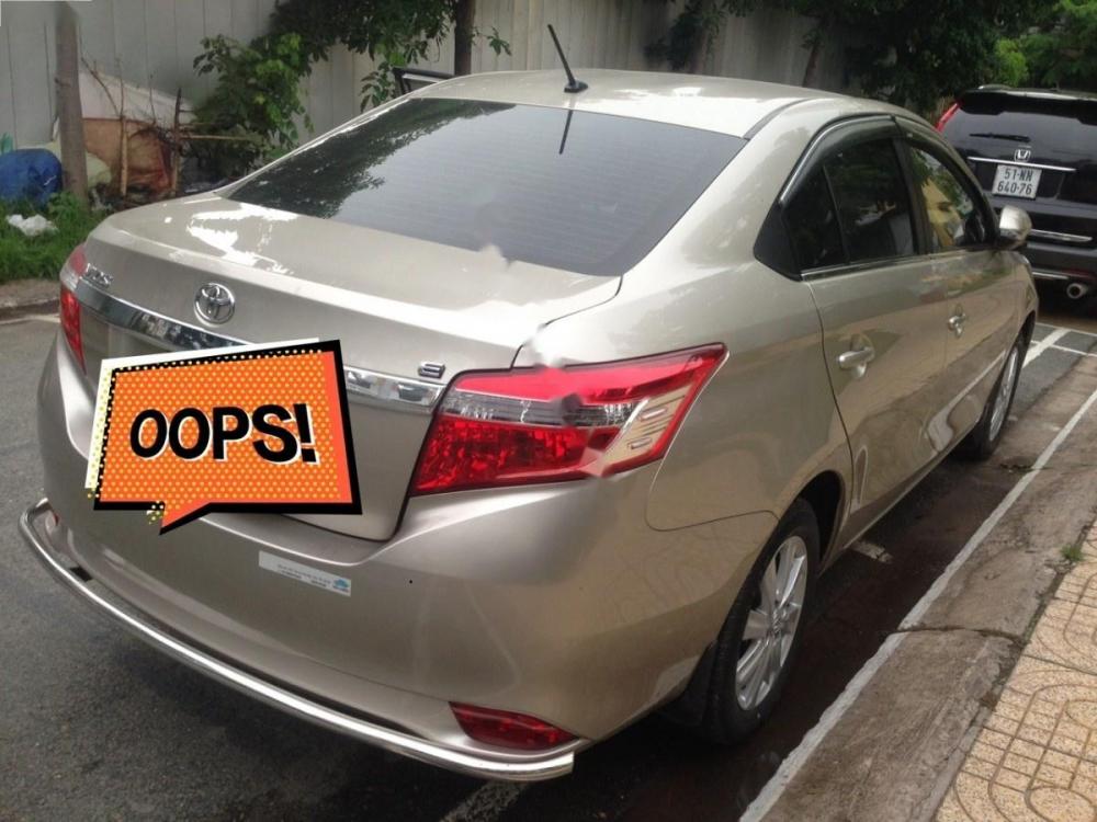 Toyota Vios 1.5E 2016 - Cần bán xe Toyota Vios 1.5E sản xuất năm 2016, màu vàng