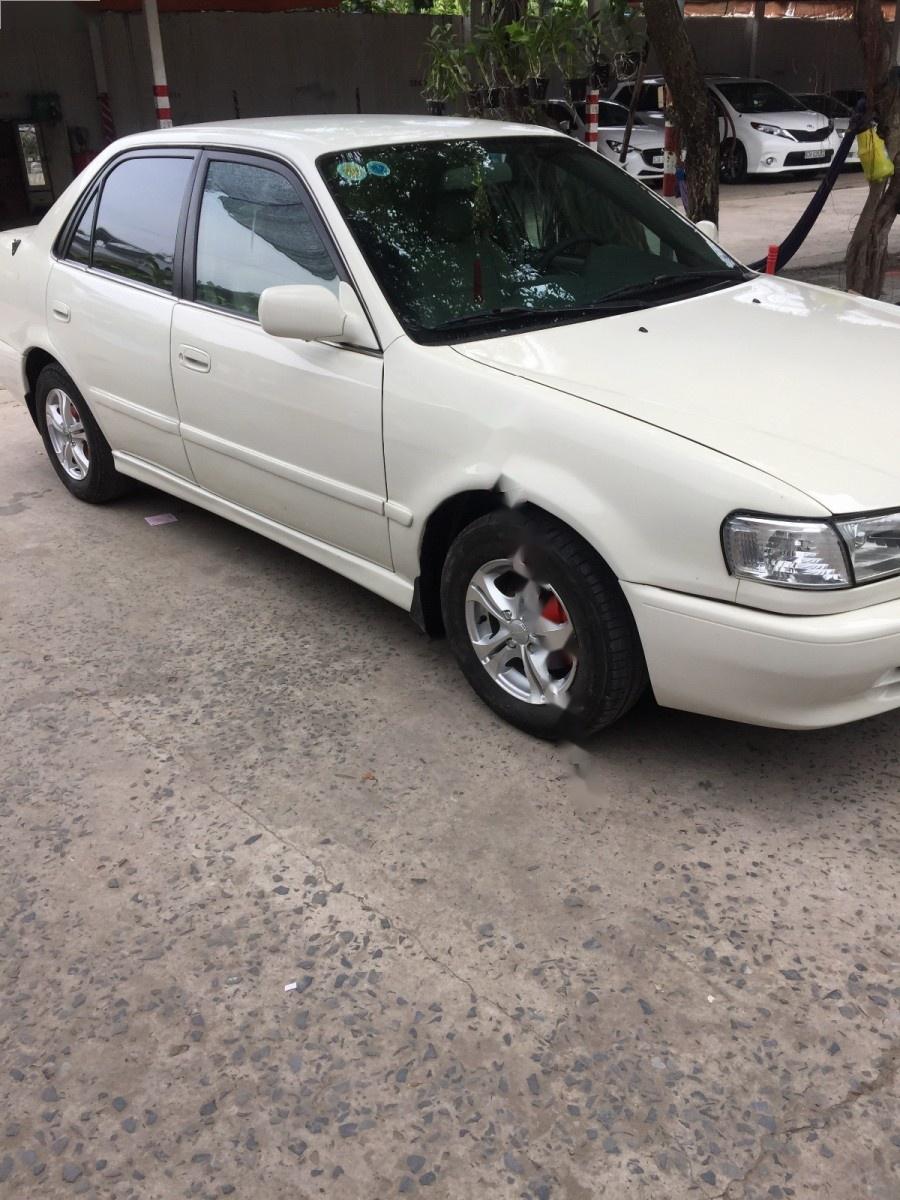 Toyota Corolla 2001 - Bán Toyota Corolla đời 2001, màu trắng, nhập khẩu nguyên chiếc, giá chỉ 190 triệu