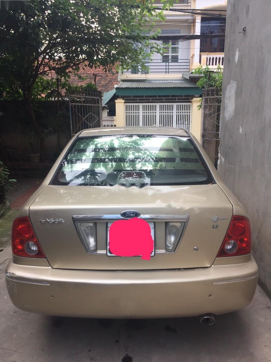 Ford Laser Ghia 1.8 MT 2003 - Cần bán lại xe Ford Laser Ghia 1.8 MT năm 2003, giá tốt