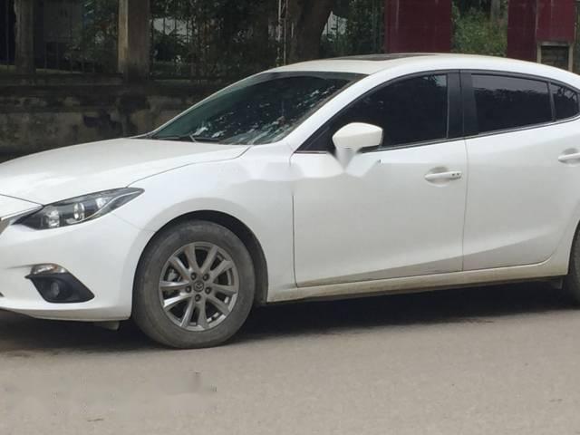 Mazda 3   AT 2015 - Bán Mazda 3 AT sản xuất năm 2015, màu trắng, giá chỉ 490 triệu