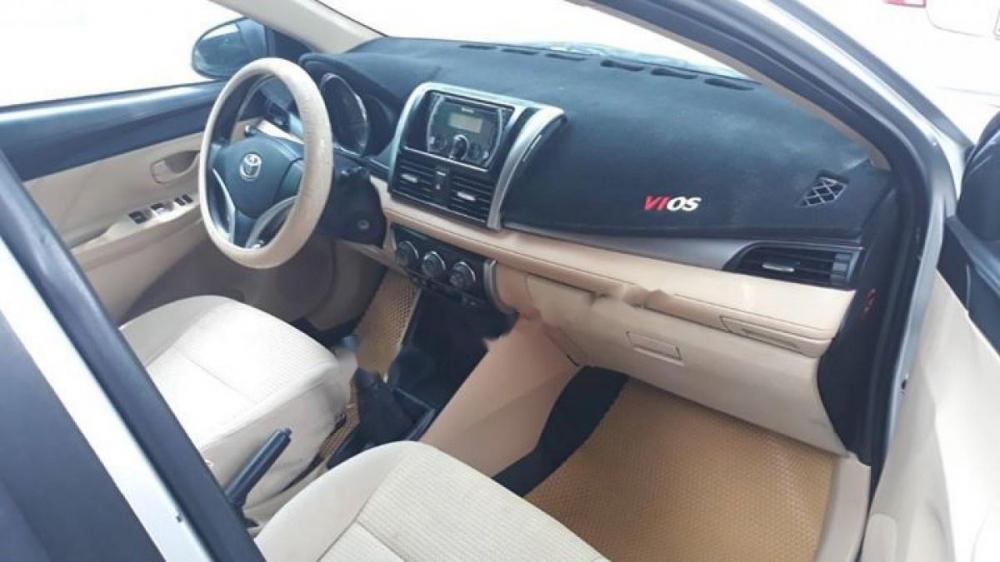 Toyota Vios 1.5E 2015 - Cần bán gấp Toyota Vios 1.5E năm sản xuất 2015, màu bạc  