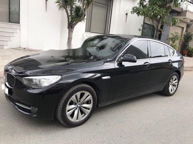 BMW 5 Series  535i GT  2011 - Cần bán lại xe BMW 5 Series 535i GT năm 2011, màu đen xe gia đình