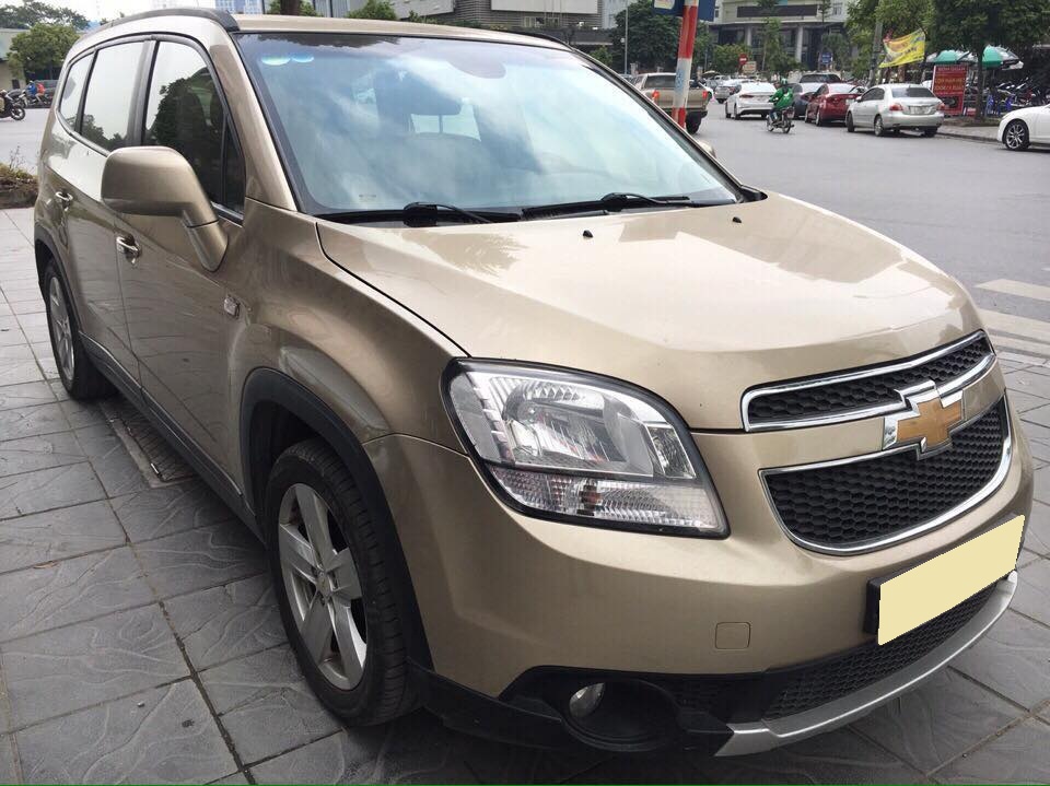 Chevrolet Orlando LT 2018 - Cần bán xe Chevrolet Orlando LT 2018 số sàn, màu vàng cát