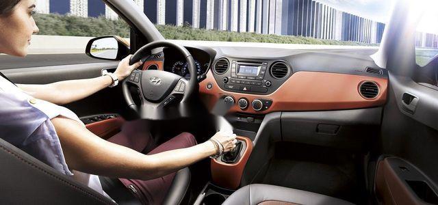 Hyundai Grand i10 E có con  chính chủ 2015 - Bán xe Hyundai Grand i10 E có con  chính chủ năm 2015, màu bạc