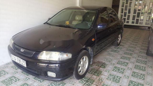 Mazda 323 1999 - Cần bán xe Mazda 323 đời 1999, màu đen