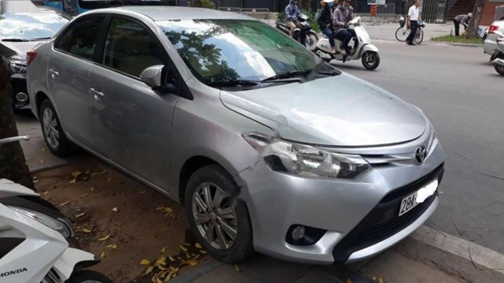 Toyota Vios 1.5E 2015 - Cần bán gấp Toyota Vios 1.5E năm sản xuất 2015, màu bạc  