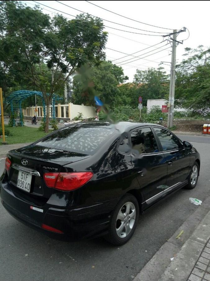 Hyundai Avante 2014 - Bán ô tô Hyundai Avante sản xuất năm 2014, màu đen 