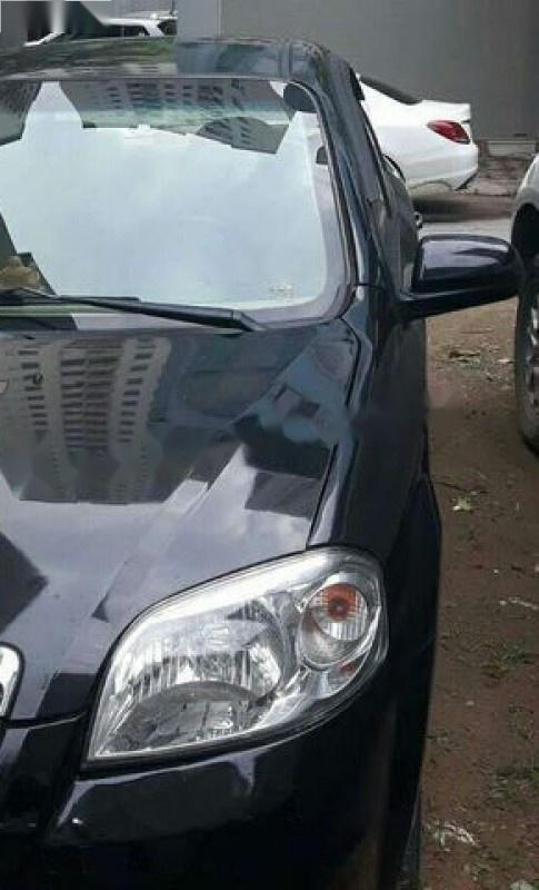 Chevrolet Aveo 1.5 MT 2013 - Cần bán lại xe Chevrolet Aveo 1.5 MT sản xuất 2013, màu đen 