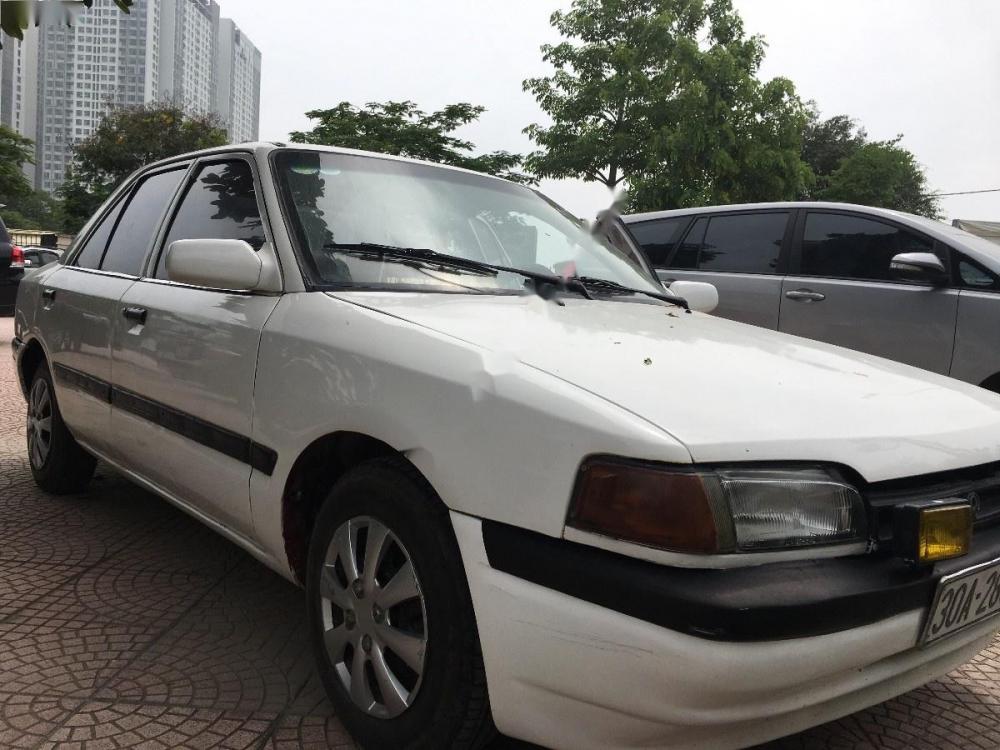 Mazda 323 1.6 MT 1996 - Cần bán Mazda 323 1.6 MT năm 1996, màu trắng giá cạnh tranh