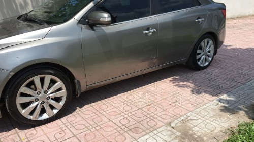 Kia Cerato  1.6L AT  2010 - Bán xe Kia Cerato 1.6L AT 2010, màu xám, xe nhập 