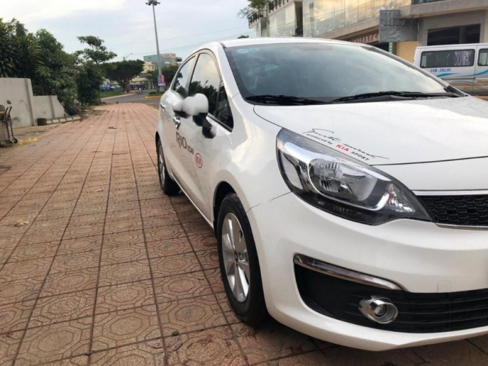 Kia Rio 1.4 MT 2015 - Cần bán xe Kia Rio 1.4MT đời 2015, màu trắng, xe nhập  