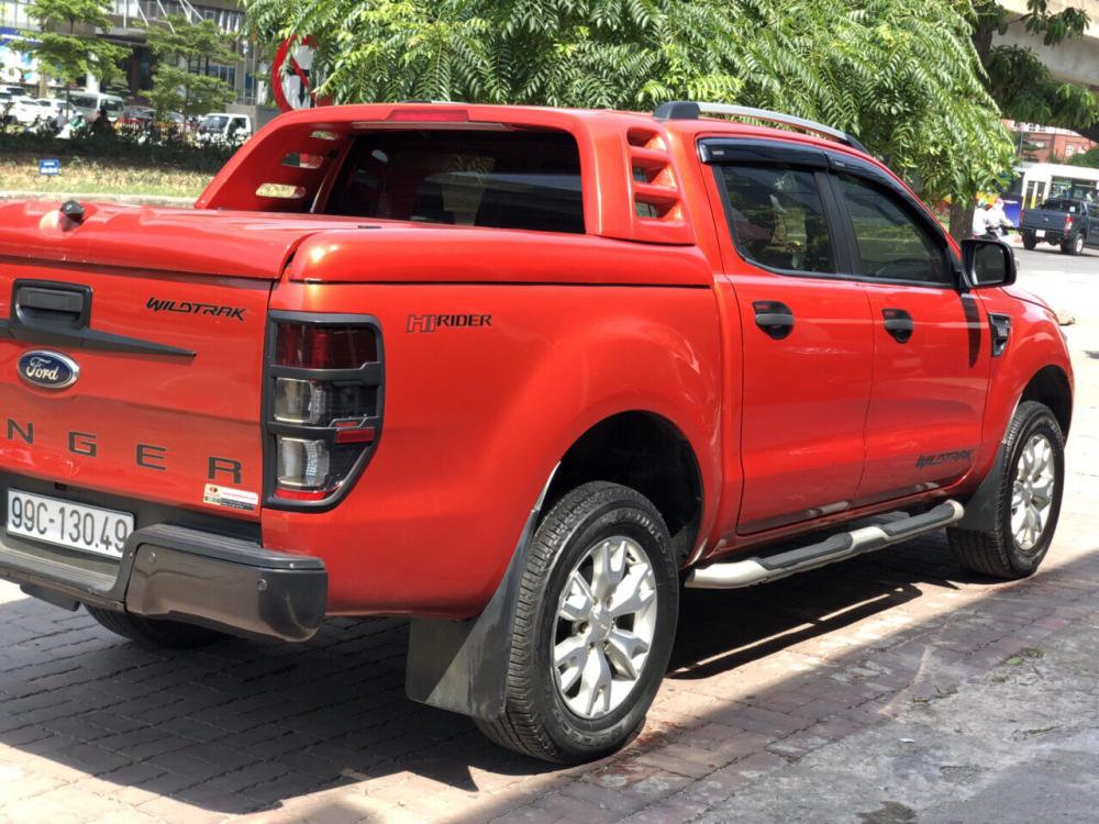 Ford Ranger Wildtrak 2.2AT 2014 - Bán xe Ford Ranger Wildtrak 2.2AT đời 2014 màu cam, giá tốt, nhập khẩu nguyên chiếc