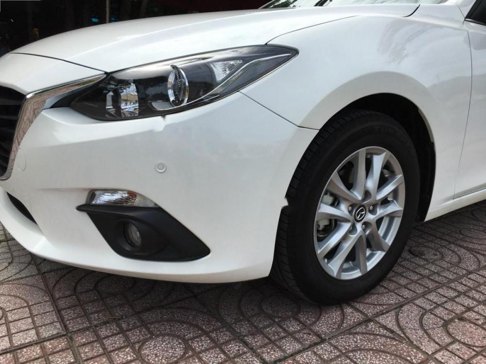 Mazda 3 1.5 AT 2016 - Bán xe Mazda 3 1.5 AT năm sản xuất 2016, màu trắng như mới giá cạnh tranh