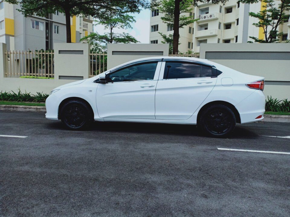 Honda City 1.5MT 2014 - Bán ô tô Honda City 1.5MT năm sản xuất 2014, màu trắng