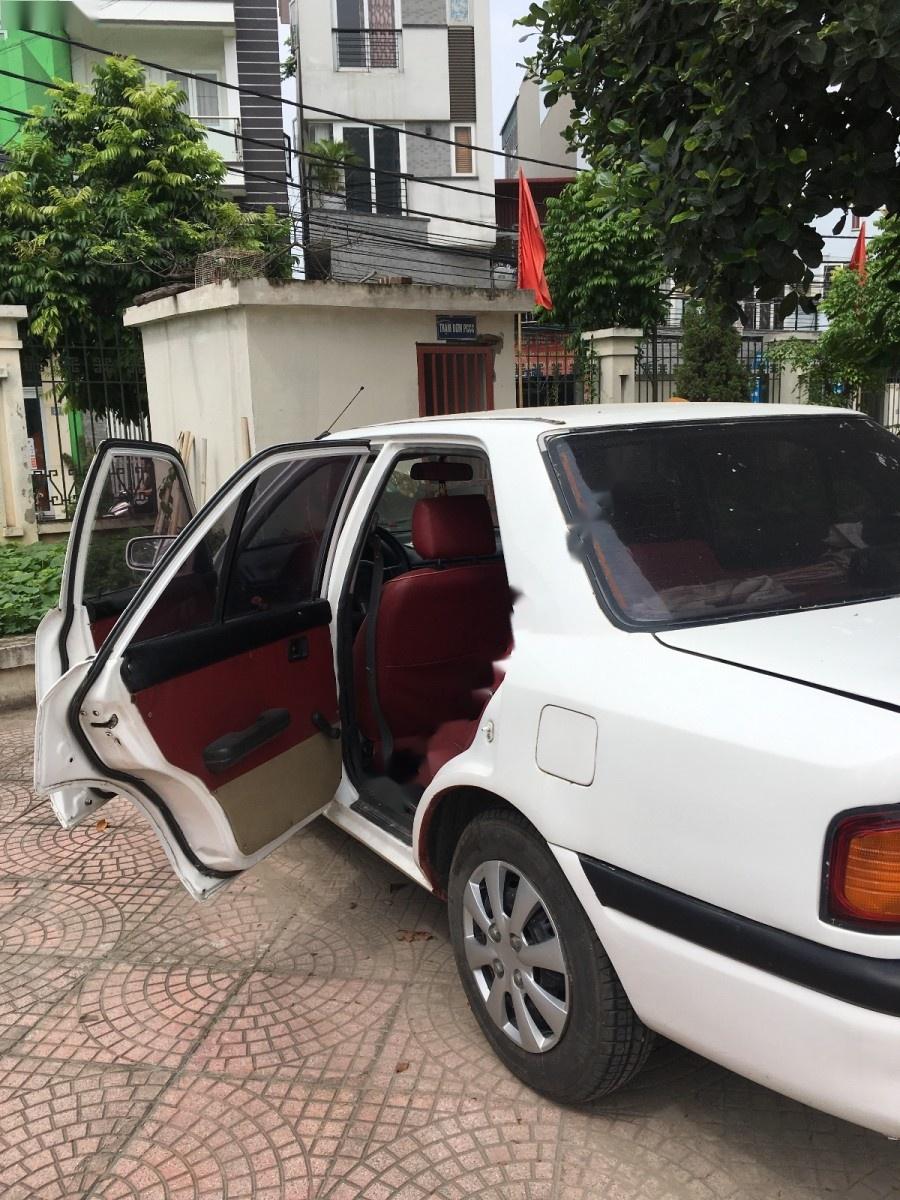 Mazda 323 1.6 MT 1996 - Cần bán Mazda 323 1.6 MT năm 1996, màu trắng giá cạnh tranh