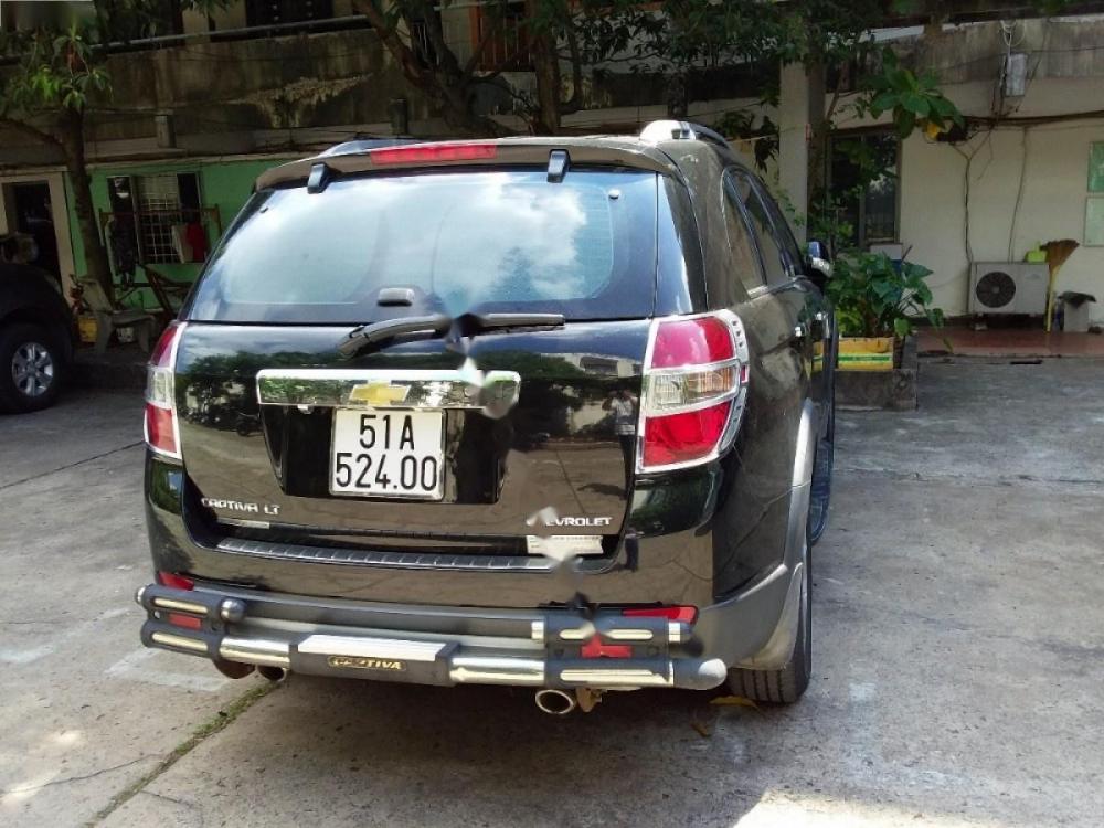 Chevrolet Captiva LT 2.4 MT 2009 - Cần bán gấp Chevrolet Captiva LT 2.4 MT năm 2009, màu đen