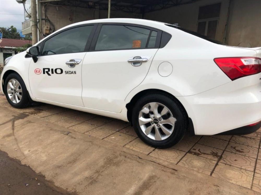 Kia Rio 1.4 MT 2015 - Cần bán xe Kia Rio 1.4MT đời 2015, màu trắng, xe nhập  