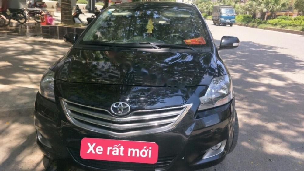 Toyota Vios 1.5 E 2013 - Cần bán gấp Toyota Vios 1.5 E đời 2013, màu đen số sàn, 388tr