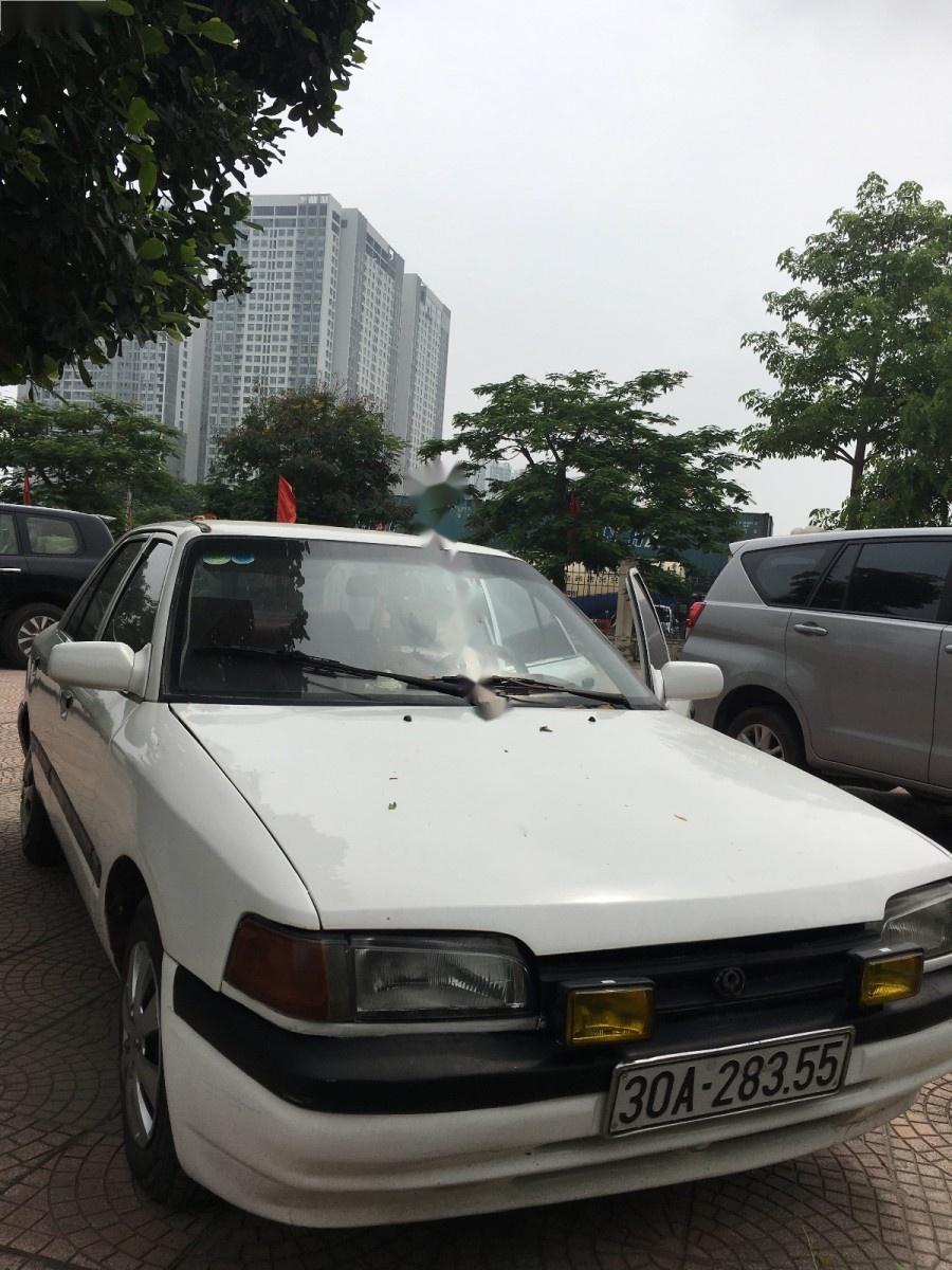 Mazda 323 1.6 MT 1996 - Cần bán Mazda 323 1.6 MT năm 1996, màu trắng giá cạnh tranh