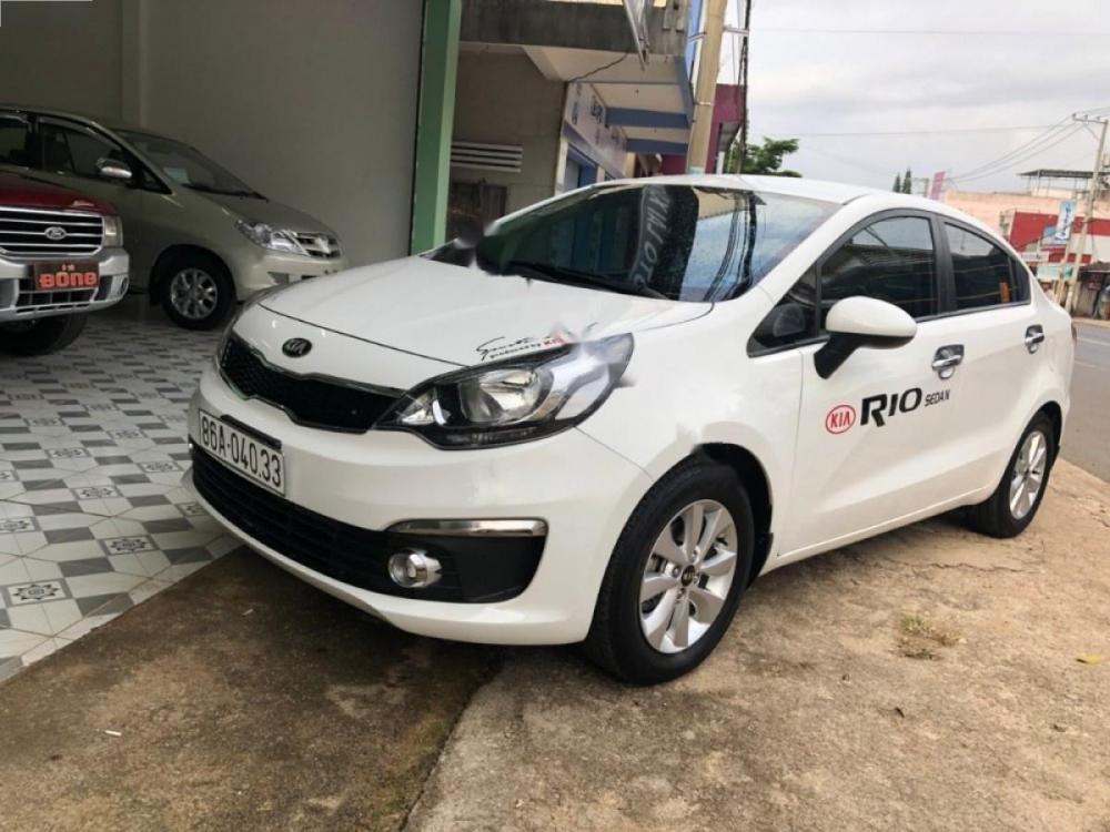 Kia Rio 1.4 MT 2015 - Cần bán xe Kia Rio 1.4MT đời 2015, màu trắng, xe nhập  