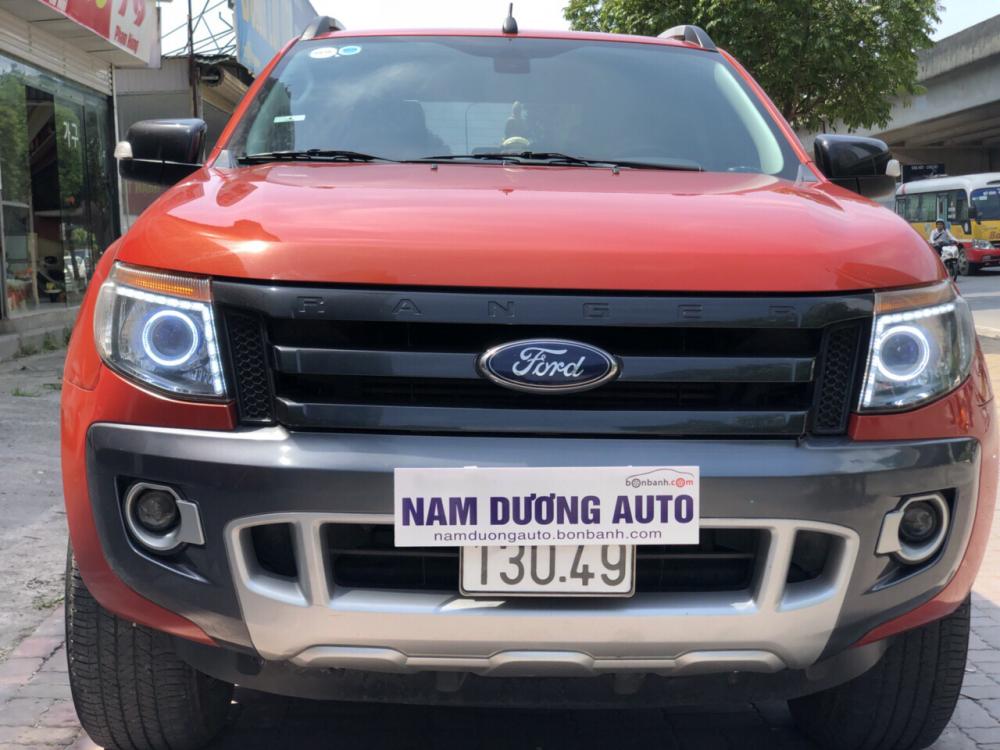 Ford Ranger Wildtrak 2.2AT 2014 - Bán xe Ford Ranger Wildtrak 2.2AT đời 2014 màu cam, giá tốt, nhập khẩu nguyên chiếc